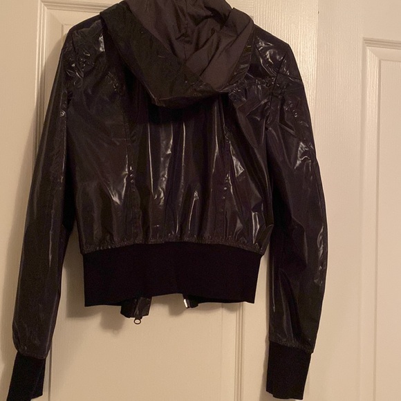 Women’s cropped bomber jacket. Shiny material. Looks blackish/grey. It is lined. - Picture 4 of 4